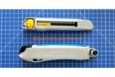 Нож, с сегментированным лезвием, металлический обрезиненный корпус, автостоп, допфиксатор, кассета на 5 лезвий, 18мм ЗУБР 09176