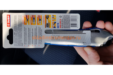 Нож, с сегментированным лезвием, металлический обрезиненный корпус, автостоп, допфиксатор, кассета на 5 лезвий, 18мм ЗУБР 09176